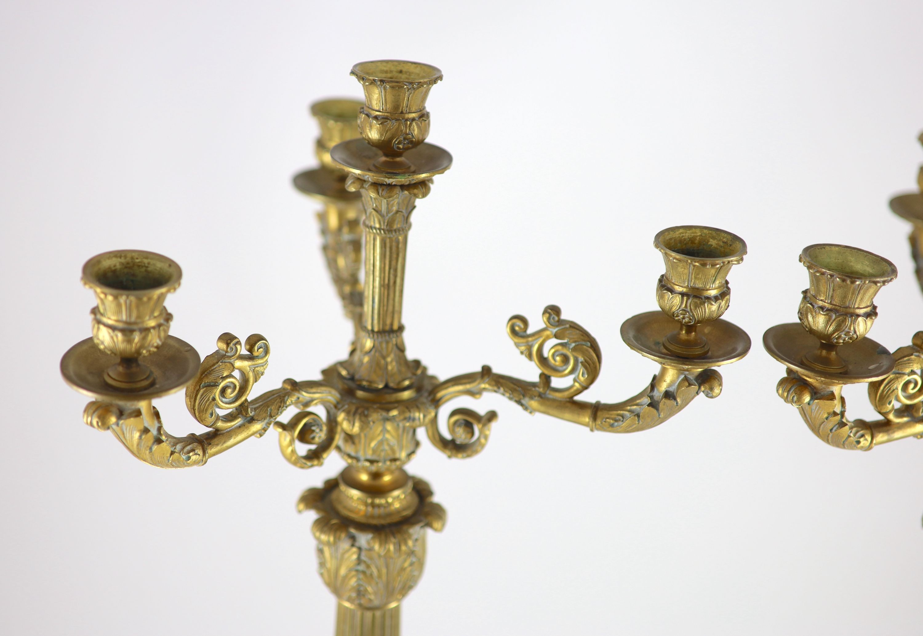 A pair of 19th century French Empire style ormolu candelabra height 70.5cm